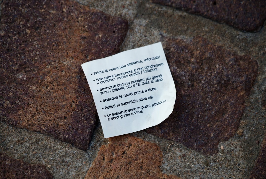 a-note-with-bullet-points-on-a-stone-wall-vydajx-gb-o